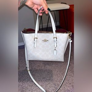 Coach bag with strap can be used as a handbag or a side bag MINT CONDITION !!